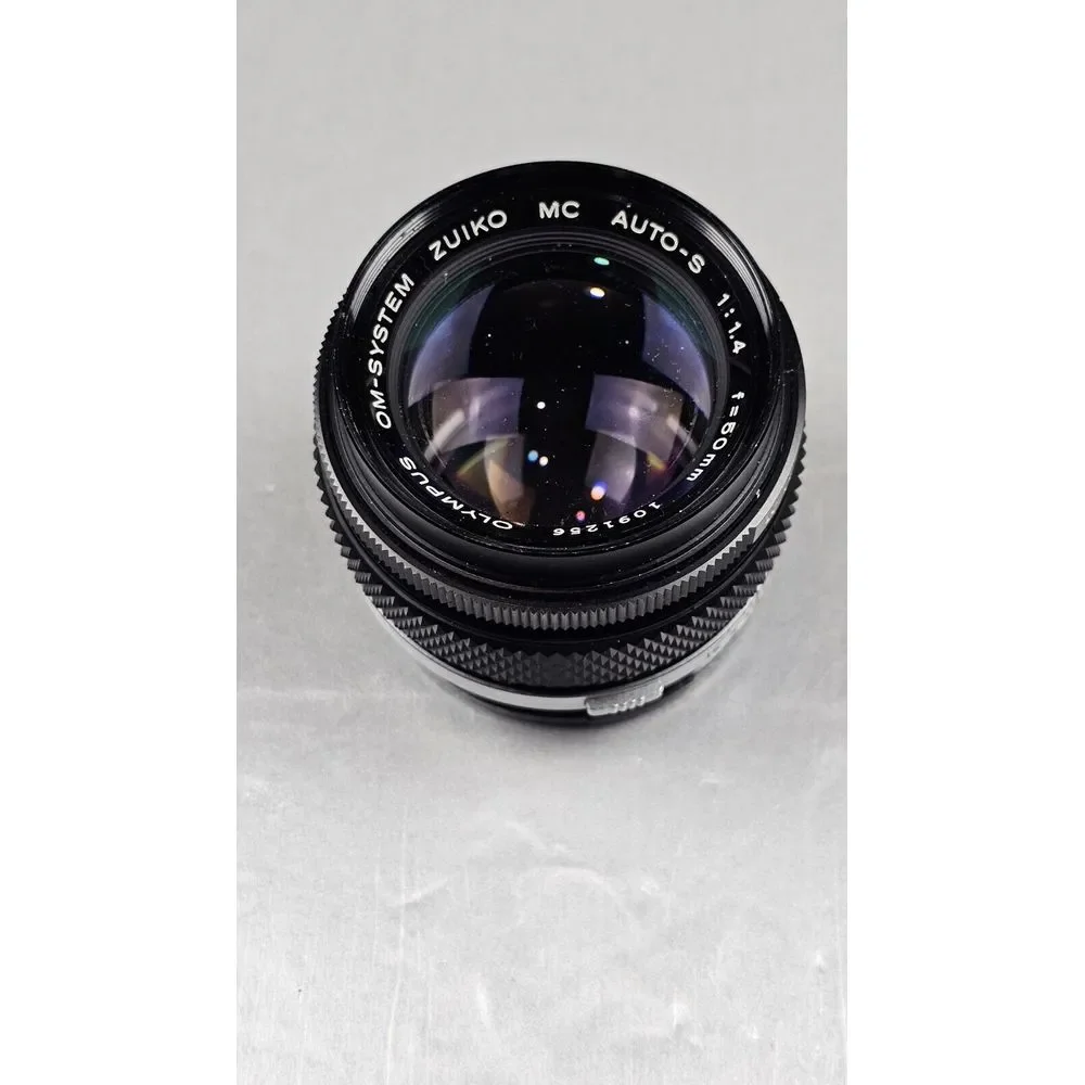 Olympus OM-1 35mm SLR Film Camera with 3 Lenses, Auto Tele Converter, Power Wind
